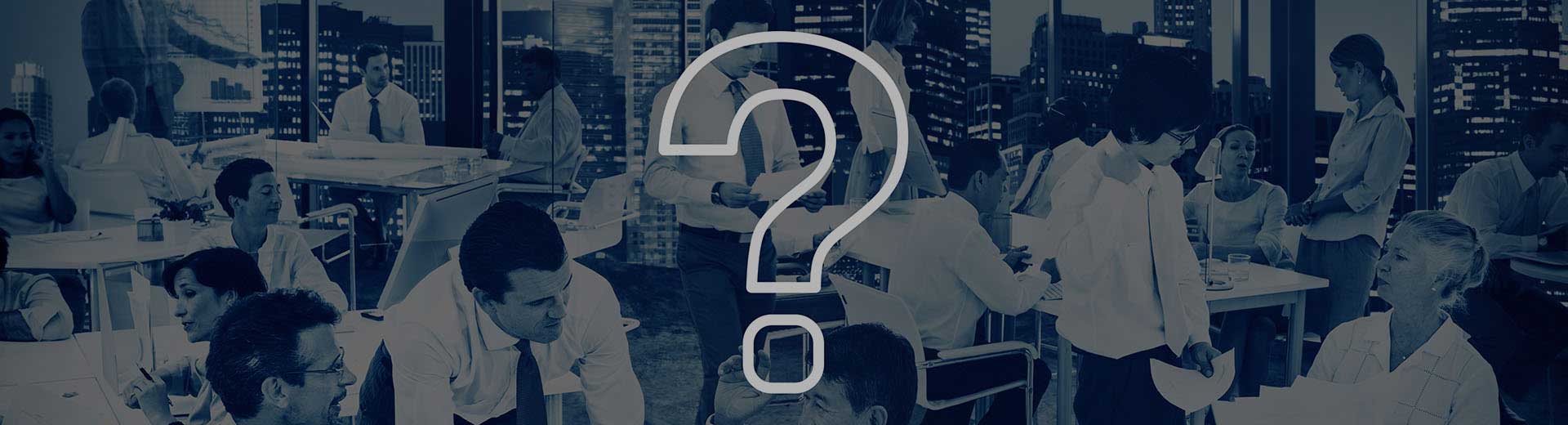 Photo of a business people in the background in a conference center overlayed with a big Question Mark.